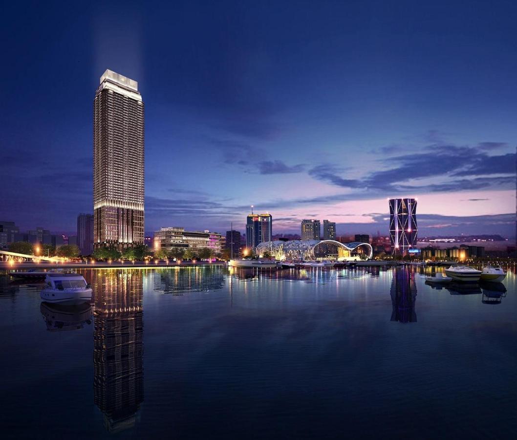 Intercontinental Kaohsiung By Ihg Hotel Luaran gambar The complex at night